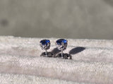 14k white gold blue sapphire scroll stud earrings