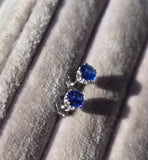 14k white gold blue sapphire scroll stud earrings