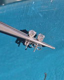 14k white gold European cut diamond scroll studs - .54ct tw