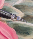 14k white gold European cut diamond scroll studs - .54ct tw
