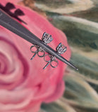 14k white gold European cut diamond scroll studs - .54ct tw
