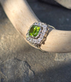 Platinum emerald cut peridot and old cut diamond estate ring