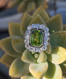 Platinum emerald cut peridot and old cut diamond estate ring