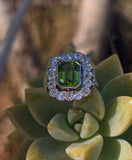 Platinum emerald cut peridot and old cut diamond estate ring
