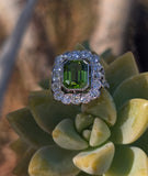 Platinum emerald cut peridot and old cut diamond estate ring