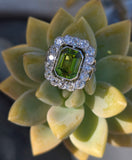 Platinum emerald cut peridot and old cut diamond estate ring