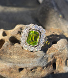 Platinum emerald cut peridot and old cut diamond estate ring
