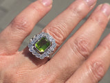 Platinum emerald cut peridot and old cut diamond estate ring