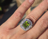 Platinum emerald cut peridot and old cut diamond estate ring