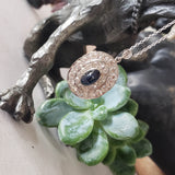 platinum top & gold vintage blue sapphire & old cut diamond halo necklace pendant