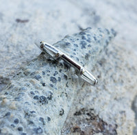 14k white gold 2 tapered baguette diamond estate band
