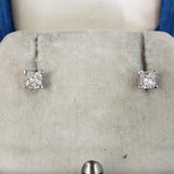 14k yellow gold princess cut diamond scroll studs earrings - .57ct tw