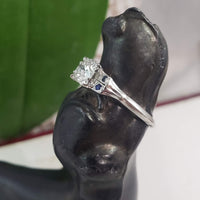 Platinum blue sapphire & diamond estate ring - .64ct