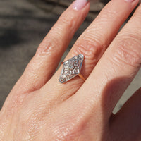 Platinum & 18k two tone Art Deco 9 diamond navette ring