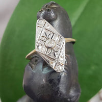 Platinum & 18k two tone Art Deco 9 diamond navette ring