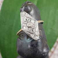Platinum & 18k two tone Art Deco 9 diamond navette ring