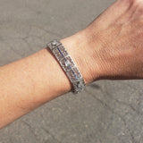 14k white gold c.20's Deco filigree diamond & blue sapphire bracelet