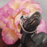 Platinum emerald cut blue sapphire & diamond estate ring