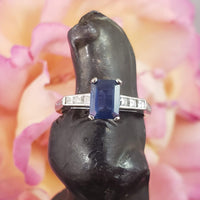 Platinum emerald cut blue sapphire & diamond estate ring