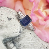 Platinum emerald cut blue sapphire & diamond estate ring