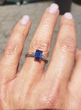 Platinum emerald cut blue sapphire & diamond estate ring
