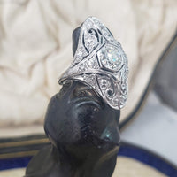 Platinum filigree c.1920's diamond glove shield navette ring