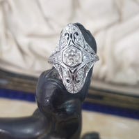 Platinum filigree c.1920's diamond glove shield navette ring