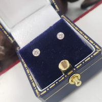 14k white gold diamond bezel studs earrings - .16ct tw