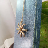 10k gold Victorian mine cut diamond & seed pearl starburst necklace pendant lavaliere pin