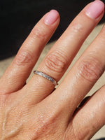 Platinum baguette & round diamond vintage curved band