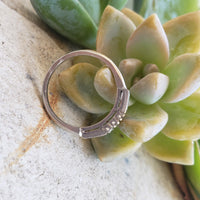 Platinum baguette & round diamond vintage curved band