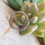 Platinum baguette & round diamond vintage curved band