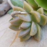 Platinum baguette & round diamond vintage curved band