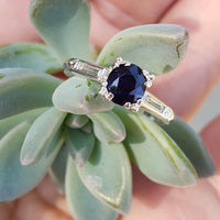 Platinum blue sapphire & baguette diamond estate ring