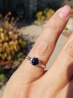 Platinum blue sapphire & baguette diamond estate ring
