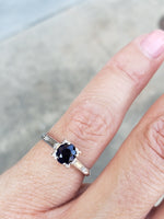 Platinum blue sapphire & baguette diamond estate ring