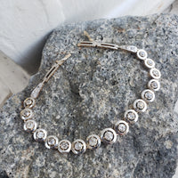 platinum & 14k gold two tone Edwardian old mine cut diamond antique tennis bracelet