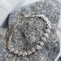 platinum & 14k gold two tone Edwardian old mine cut diamond antique tennis bracelet