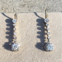 platinum top & 18k gold Edwardian old cut diamond filigree lever back earrings