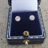 14k white gold European cut diamond bezel stud earrings - .40ct tw