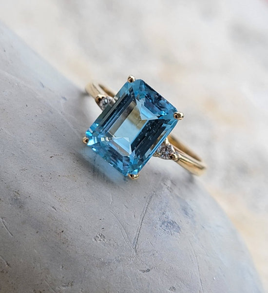 14k gold blue topaz & diamond ring - emerald cut