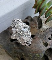 18k white gold filigree c.1920's diamond glove shield navette ring
