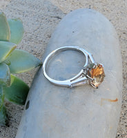Platinum precious topaz & baguette diamond ring - pear cut