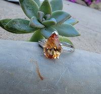 Platinum precious topaz & baguette diamond ring - pear cut