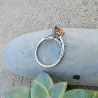 Platinum precious topaz & baguette diamond ring - pear cut