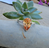 Platinum precious topaz & baguette diamond ring - pear cut
