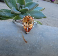 Platinum precious topaz & baguette diamond ring - pear cut