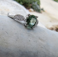 platinum green sapphire & diamond estate ring