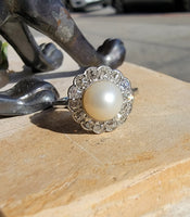 Platinum Edwardian pearl & diamond halo ring