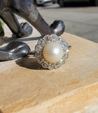 Platinum Edwardian pearl & diamond halo ring